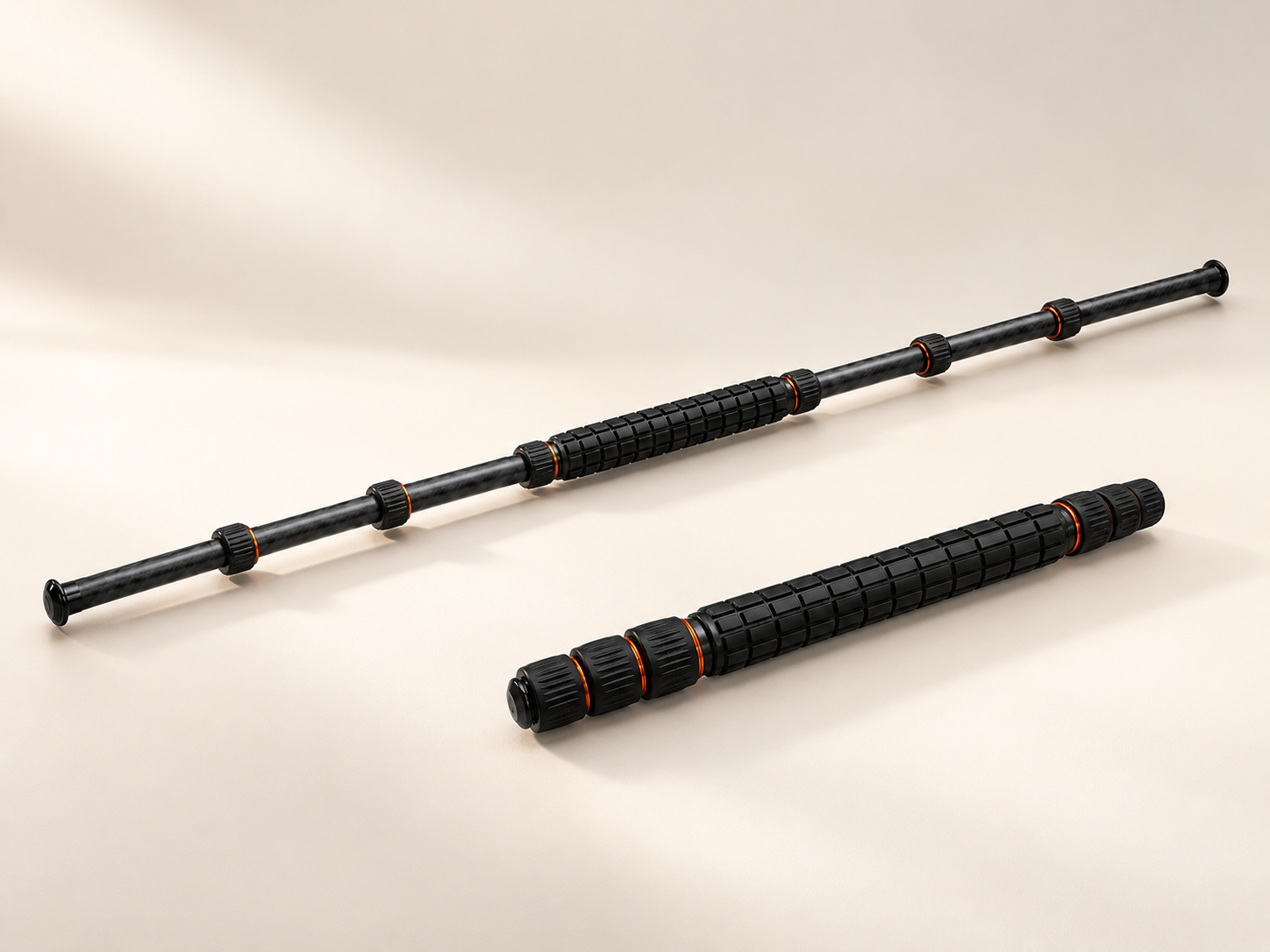 Editorial illustration of the black RUYI tool with its integrated roller, shown extended and folded.